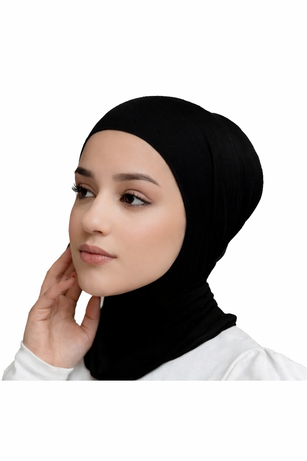 Woman wearing a black hijab on a white background