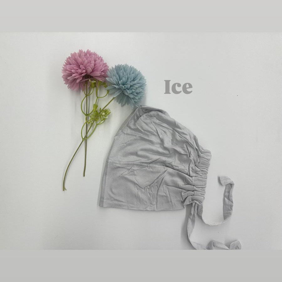 Gray baby romper with pink and blue flowers on a white background