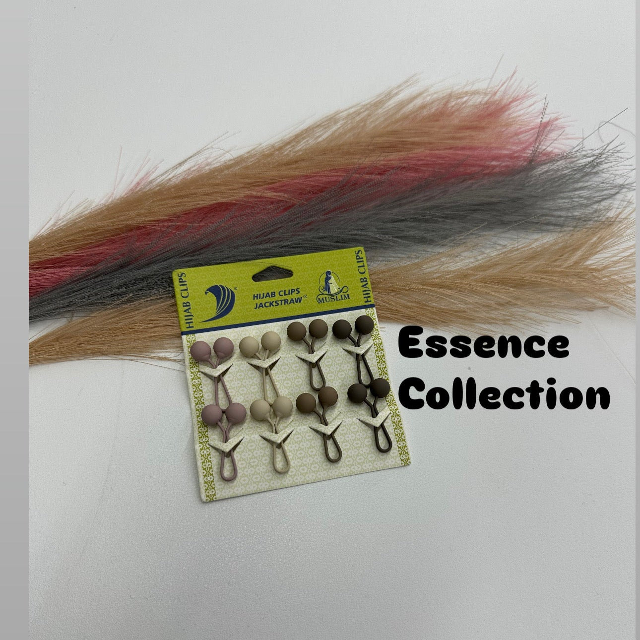 Hair clips in a package with hair extensions on a white background
